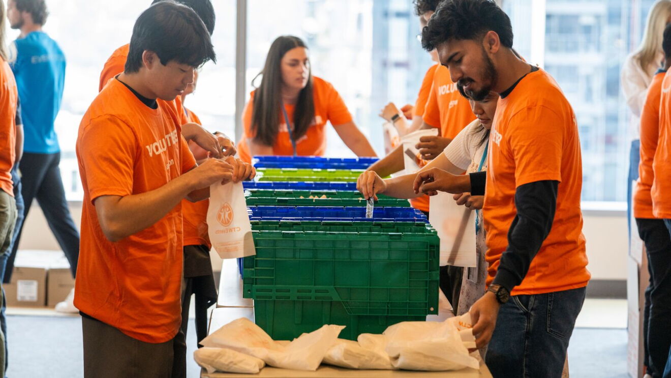 Amazon employees packing donation items for disaster relief efforts for the Spokane fires