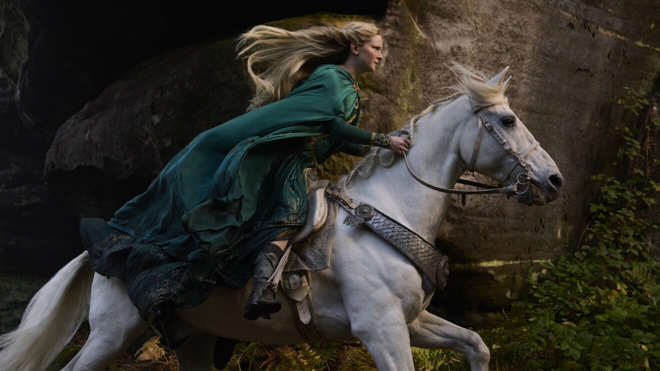 LOTR woman riding a white horse fast