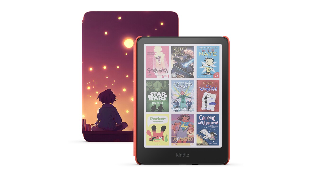 Kindle device displaying children's book covers next to colorful sunset scene