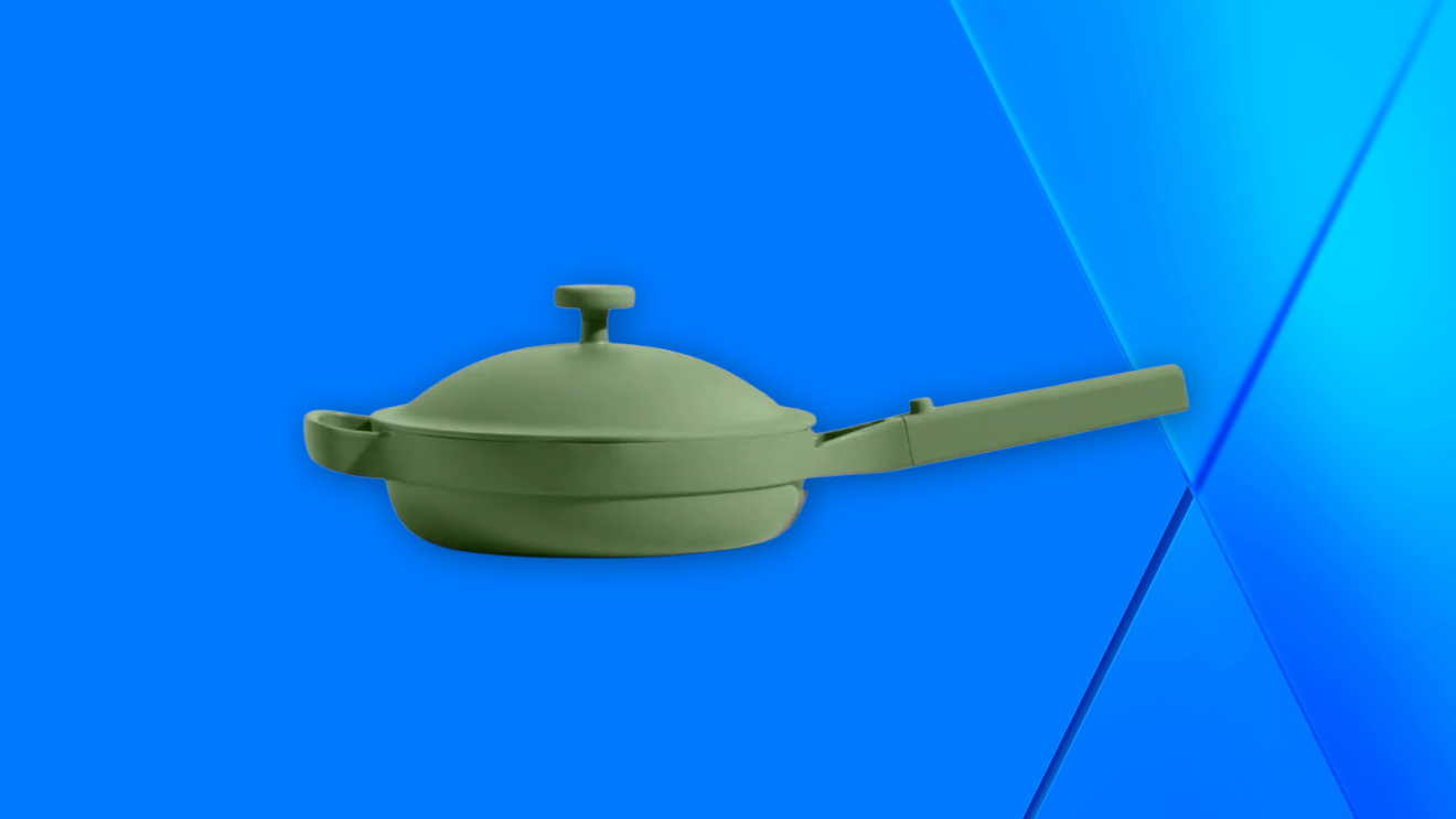 Our Place Mini Always 8.5-inch Ceramic Pan with Modular Lid against a blue background.