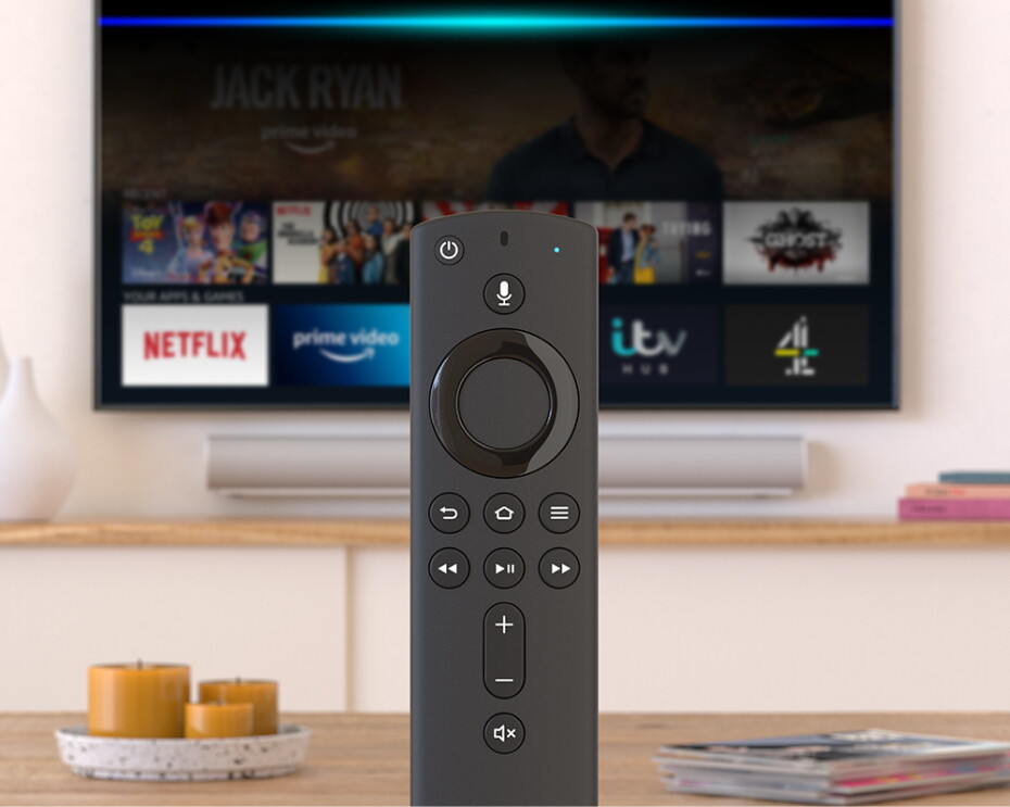 Fire TV remote in front of a television.
