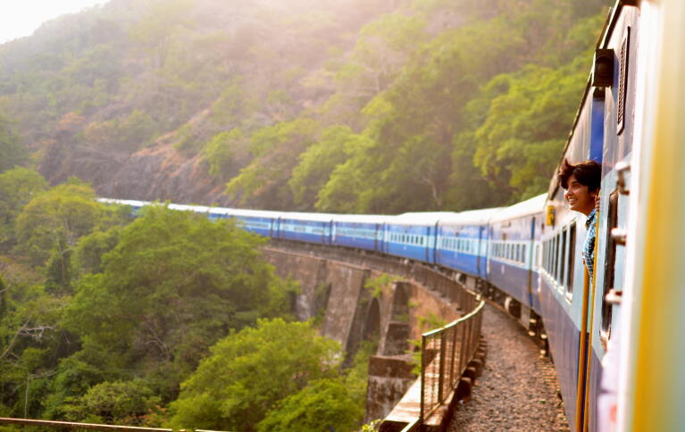 Train passing by a scenic landscape
