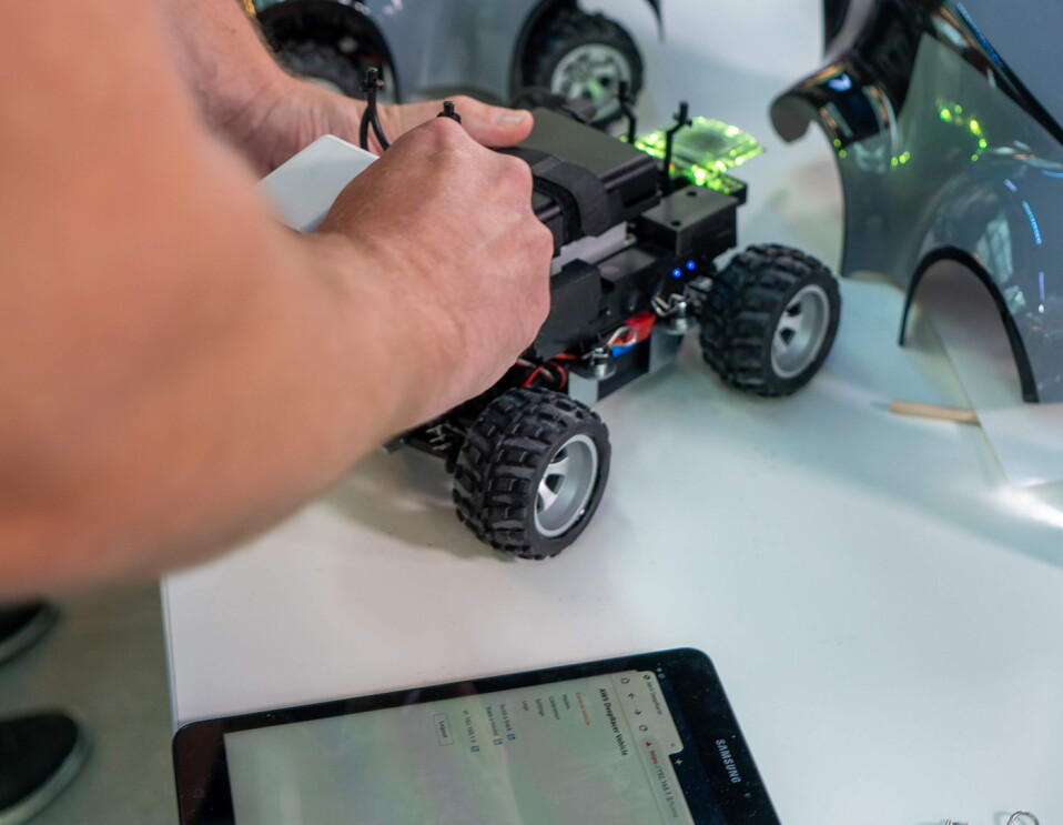 AWS DeepRacer car and track, a machine learning car with adult and kids' leagues