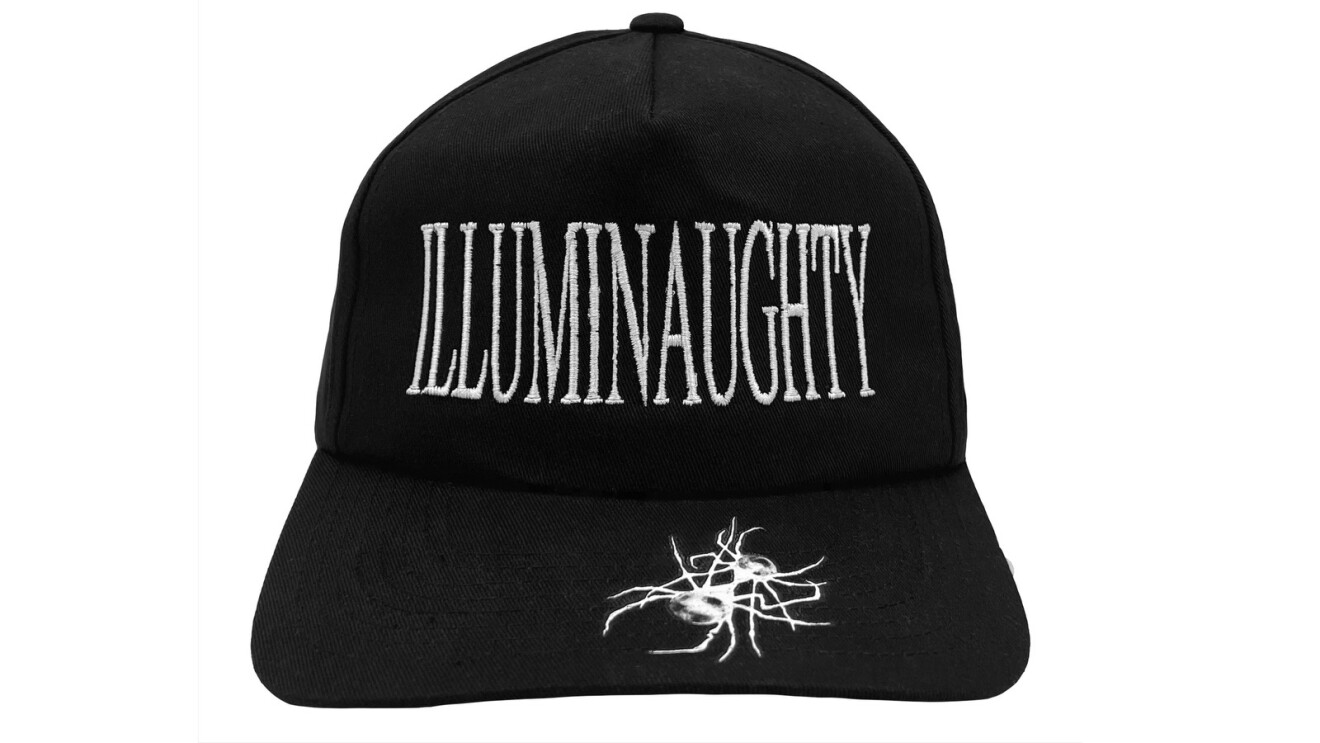 A black, flat-brimmed hat that says "ILLUMINAUGHTY" on the front in white lettering. On the bill is a white image of two spiders holding each other.