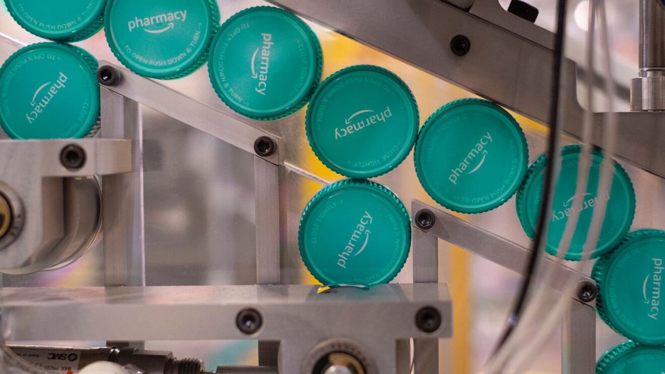 Automated Amazon Pharmacy bottle cap assembly process