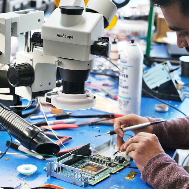 An engineer assembling hardware at Annapurna Labs.