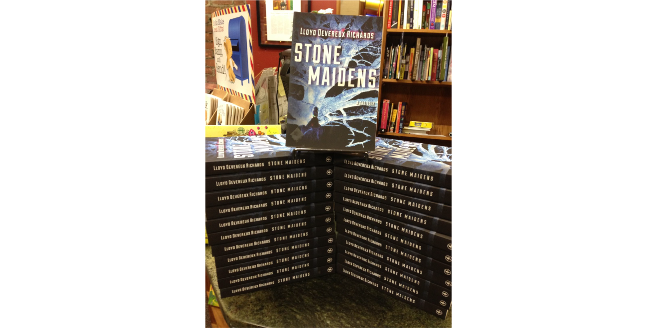 A photo of book copies of ''Stone Maidens" displayed in a store.