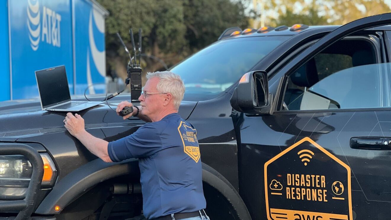 Amazon disaster relief personnel using technology in field deployment scenario