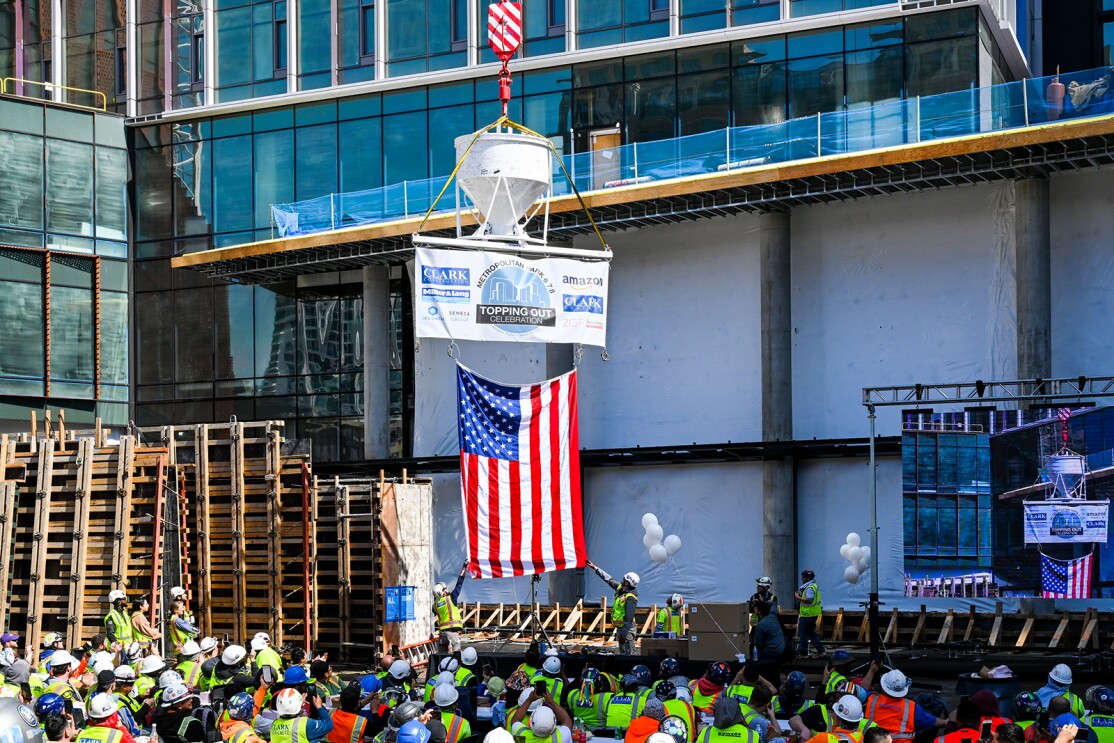 An image of the "top out" event celebration for Amazons HQ2's Met Park.