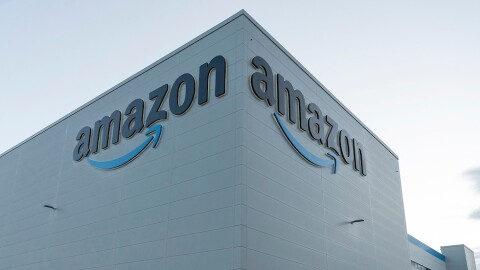 Amazon logo on the front and side of a Fulfilment centre 