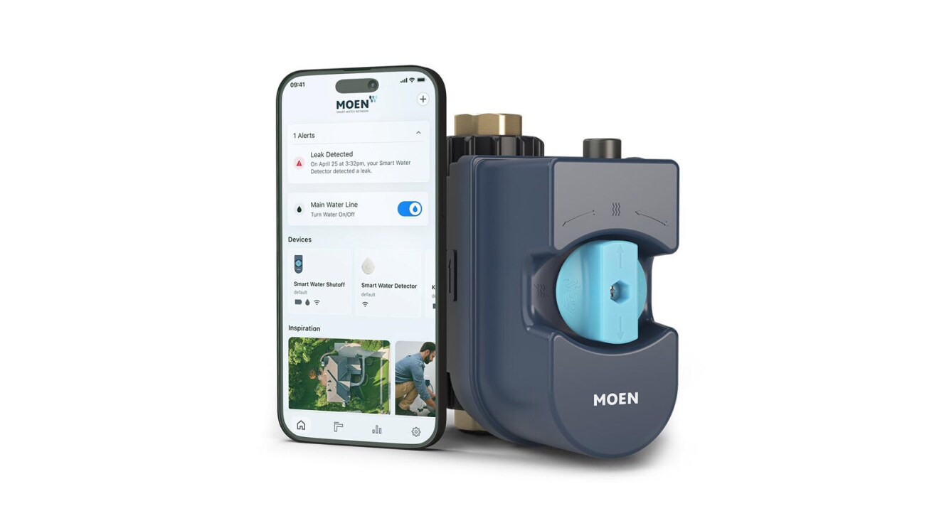 An image of the smart water sensor from moen. There is a cell phone next to the device that shows how it works to protect your home from water damage.