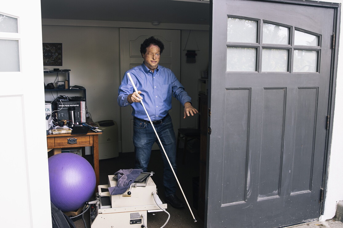 Josh Miele, Principle Accessibility Researcher at Amazon Lab126, exits his home office.
