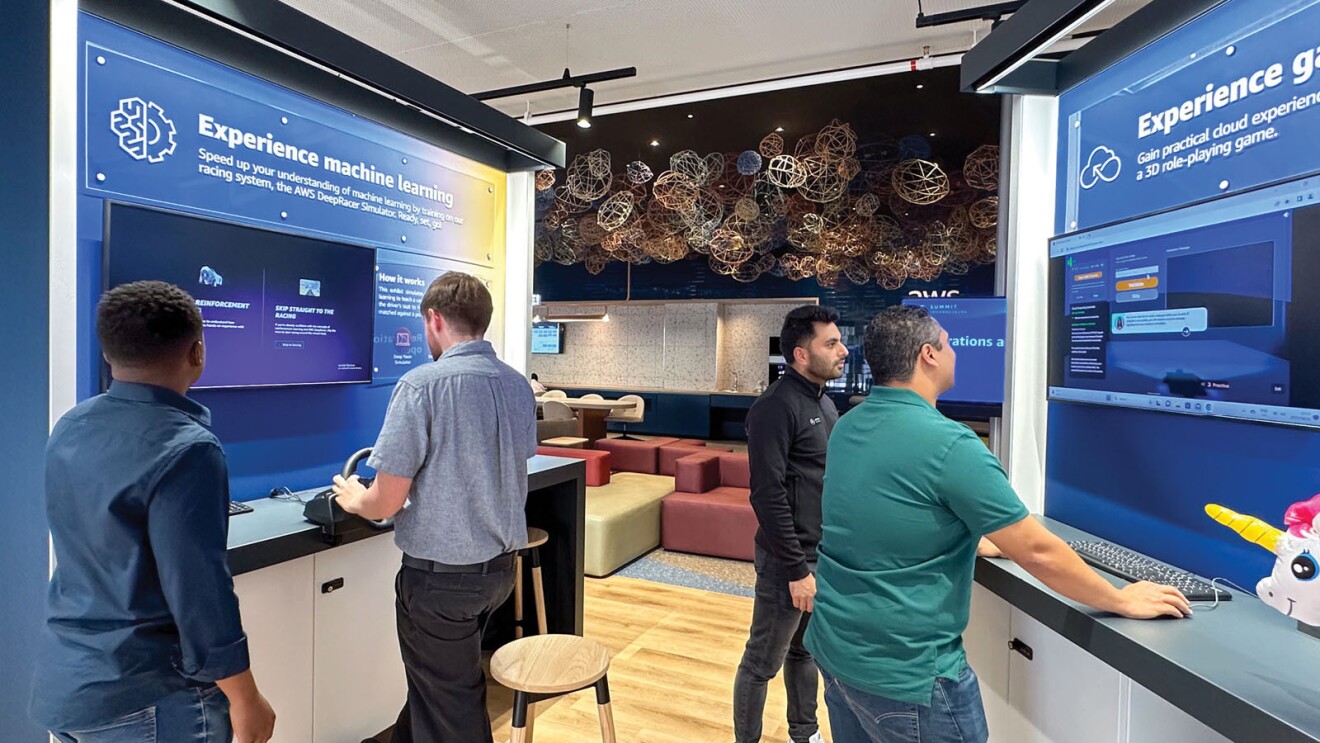 visitors to the new aws skills center in cape town south africa learning machine learning and cloud skills through interactive games 