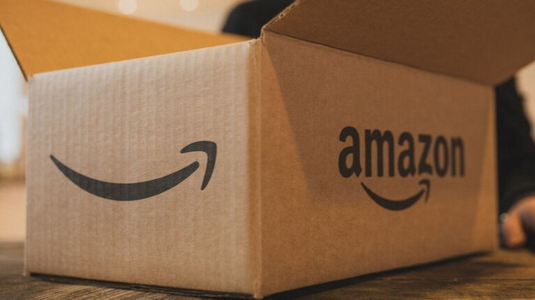 Amazon's iconic smiling arrow on cardboard box