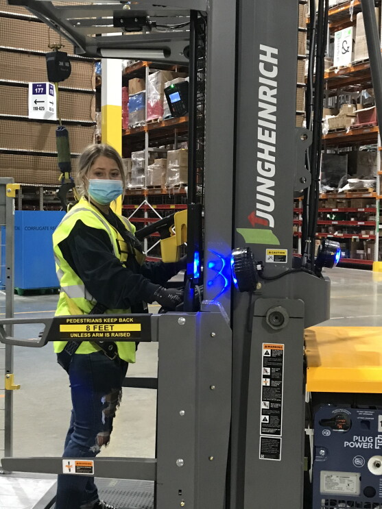 Amazon employee working at a fulfillment center