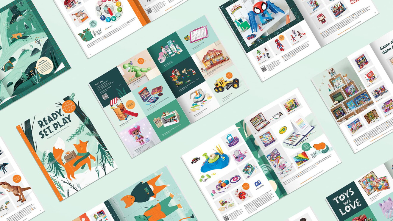 An image with a light blue background that shows open toy catalogs with illustrations open and laying flat across the background.
