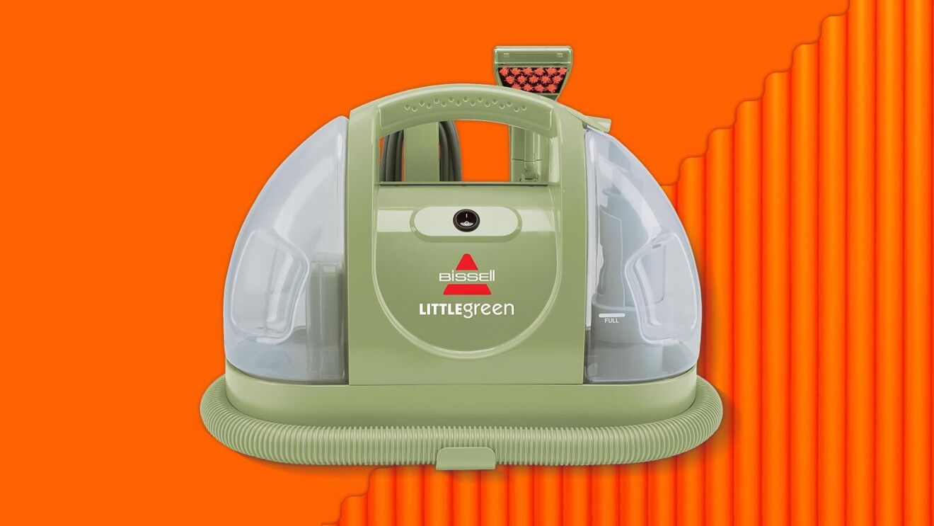 Bissell LITTLEgreen compact carpet cleaner on vibrant orange backgroun