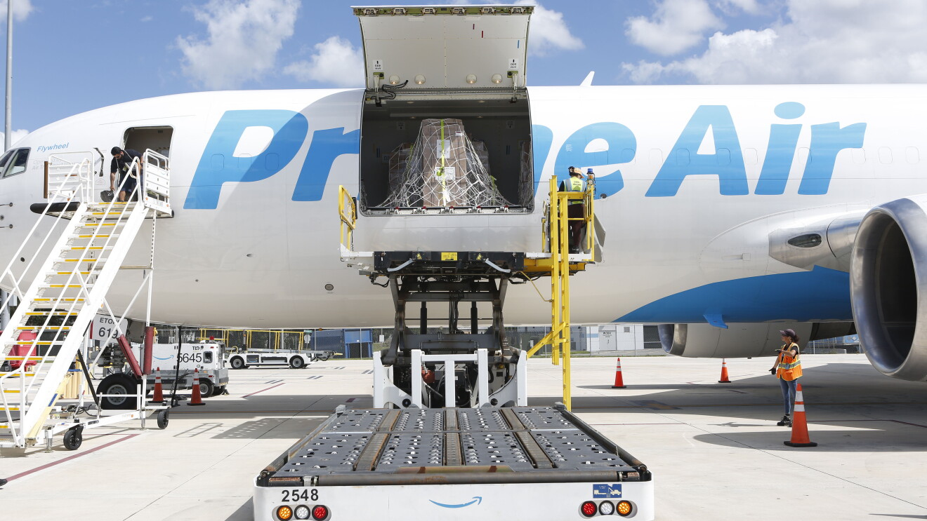 Cargo being loaded onto Prime Air plane with raised cargo door by DRbA for Hurricane Milton