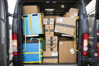 Packages Inside Amazon Branded Van 
