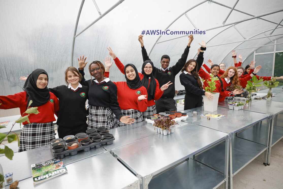 Irish students pose for photo for AWS in Communities event