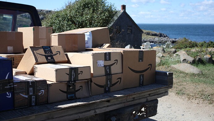 Amazon packages travel by boat, vehicle, and are delivered directly to customers.