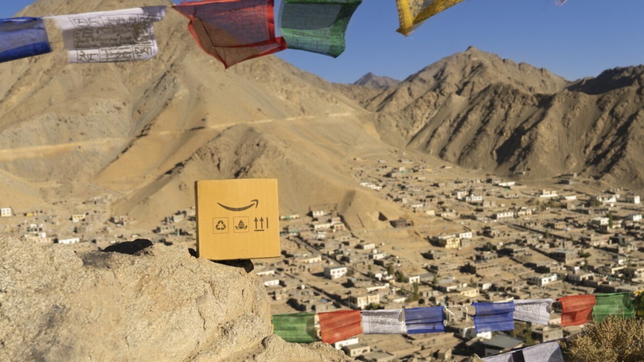 An Amazon box against the backdrop of Leh