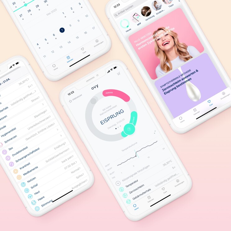 Auf einer rosanen Unterlage liegen Handys mit Bildern der App Ovy.
