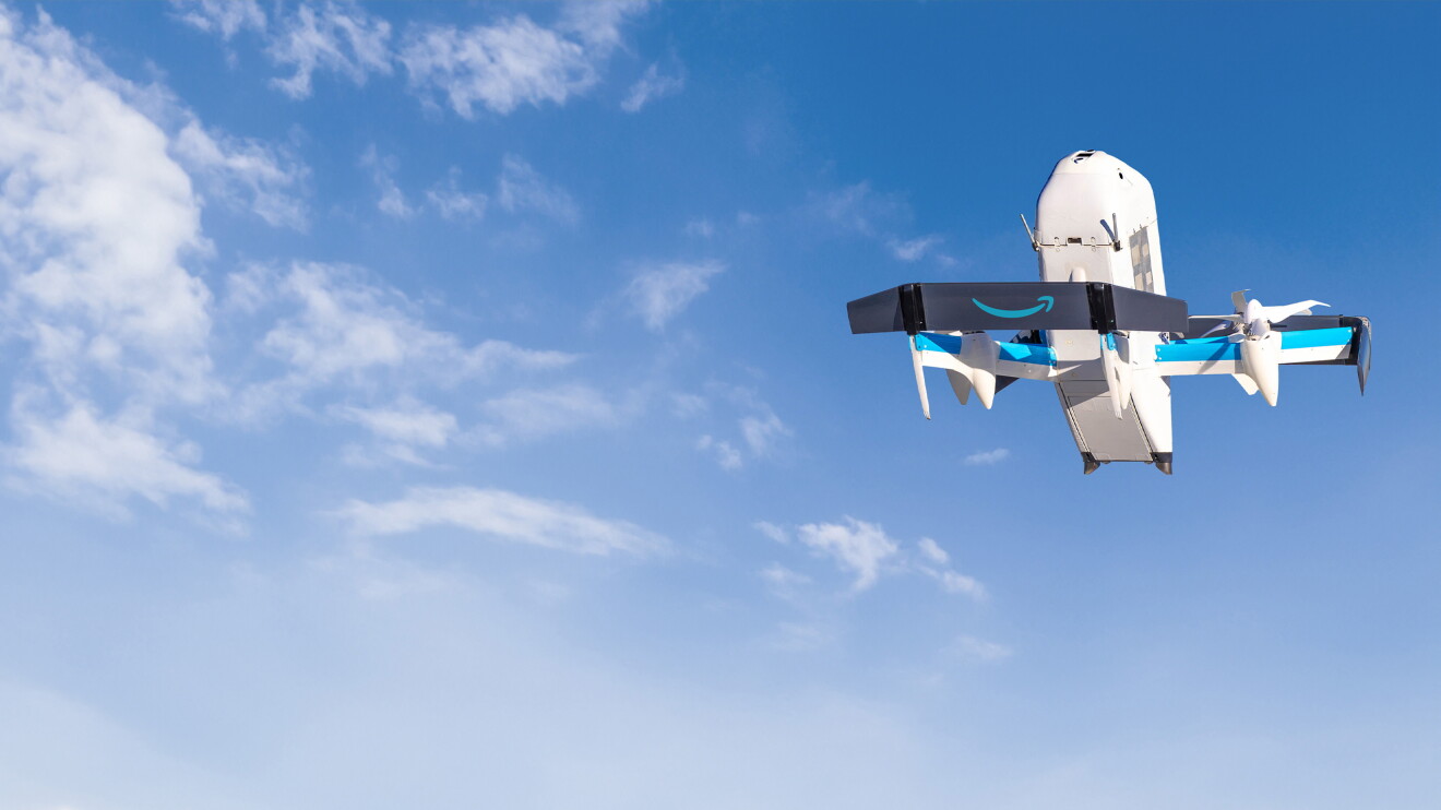 A shot of Amazon's new MK30 delivery drone hovering in the sky.