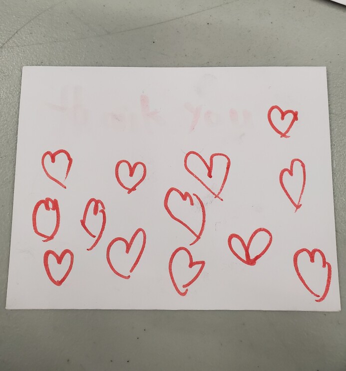 Amazon Scout bot posed in front of iconic landmarks