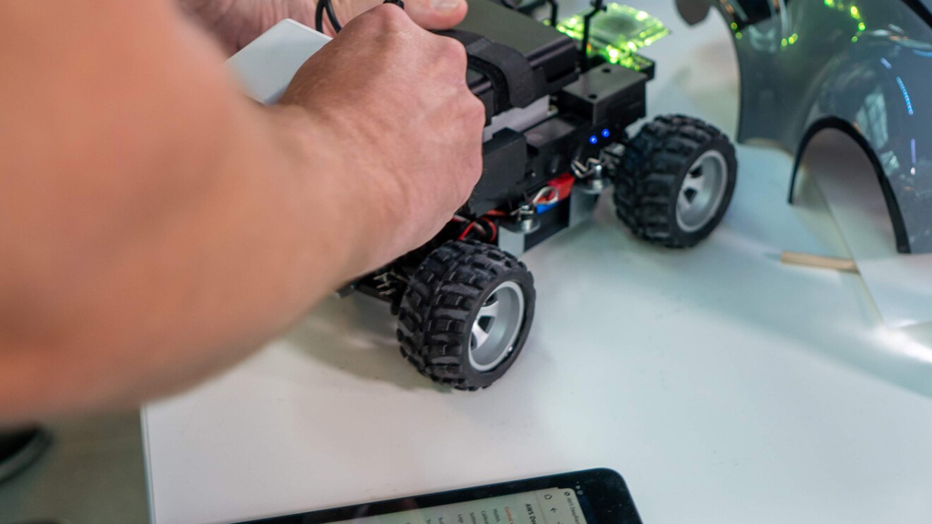 AWS DeepRacer car and track, a machine learning car with adult and kids' leagues