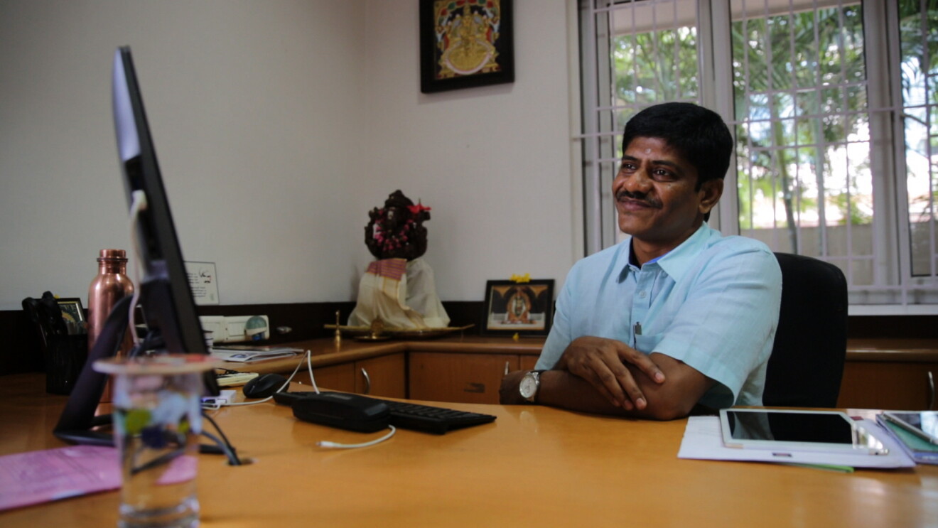 Sivaraj of the Espresso brand of knitwear at his workplace and with his family