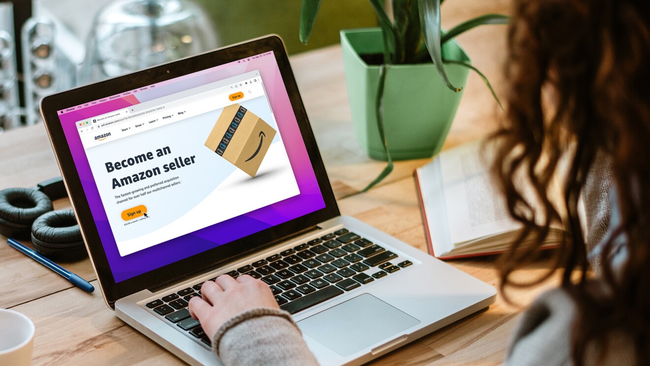 笔记本电脑设备的照片。屏幕上,“成为和亚马逊卖家”