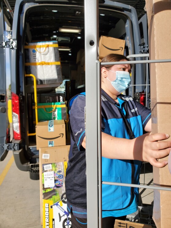 Amazon employee working at a fulfillment center