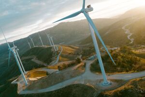 Renewable energy landscape with wind turbines and river