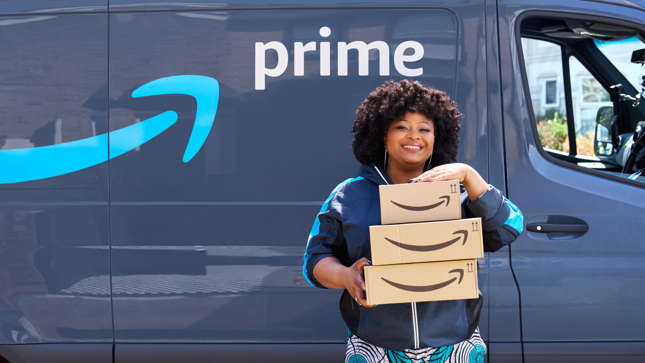 Gbemi Ikumelo stands in front of an Amazon Prime van to deliver packages for Prime Day 2026