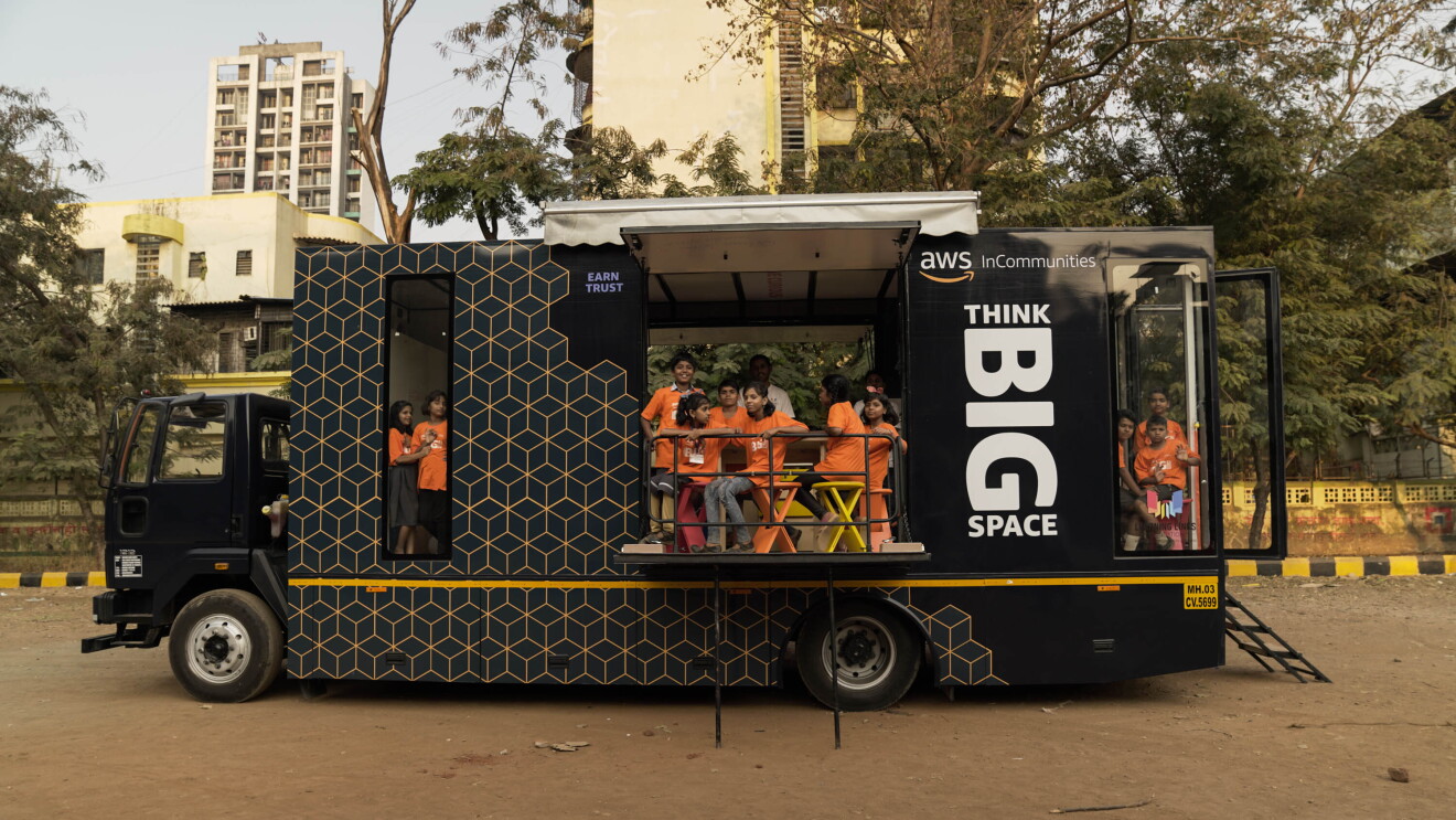 Kids sitting inside a bus that will hold  STEM classes 