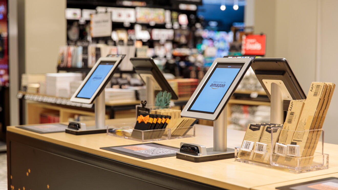 Checkout kiosks at the Amazon 4-star store. The four checkouts include a tablet, card reader, barcode to scan from the Amazon app, along with batteries and Amazon gift cards. 