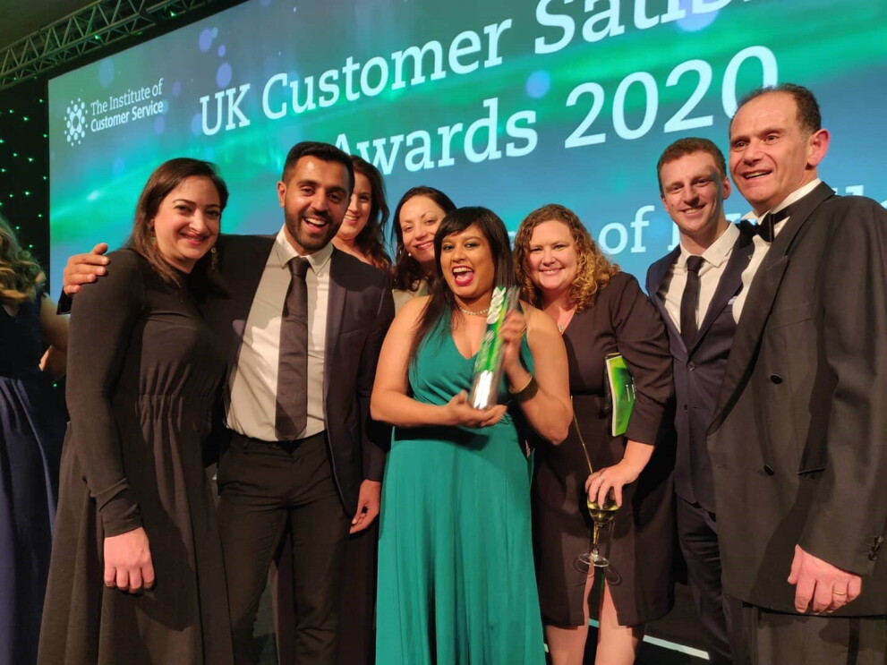 Amazon employees collecting best customer service of the decade award