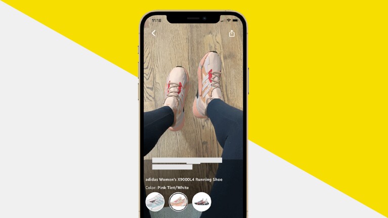 '一天2023人生活博客最佳交易:虚拟视图试穿图像显示在iPhone。