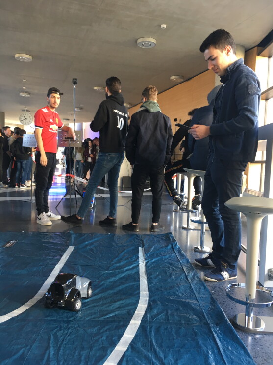 Student trying a deepracer car 