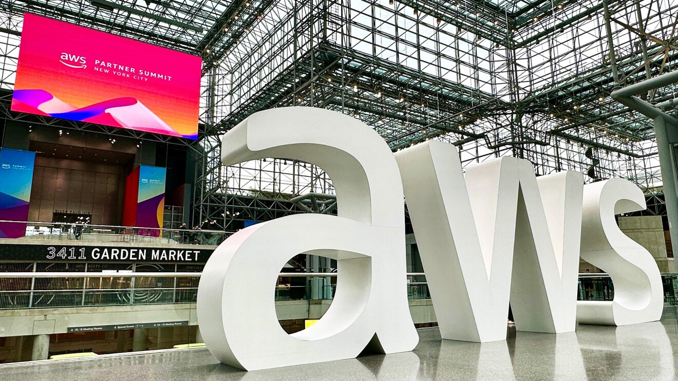 A photo of an AWS sign inside the convention cent at AWS Summit New York