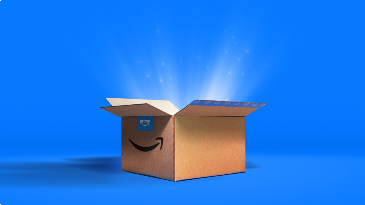 Prime Day 2023 live blog best deals: hands holding up Amazon boxes.