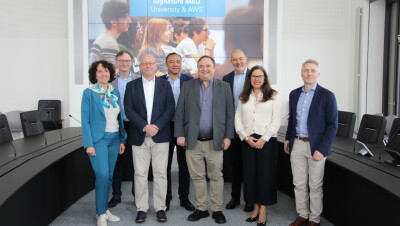 AWS and University of Luxembourg leaders after signing the MoU. 