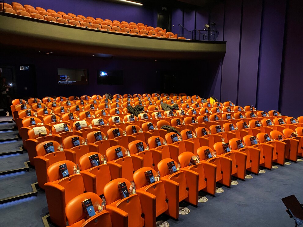 Orange seats at the Your Christmas or Mine 2 screening