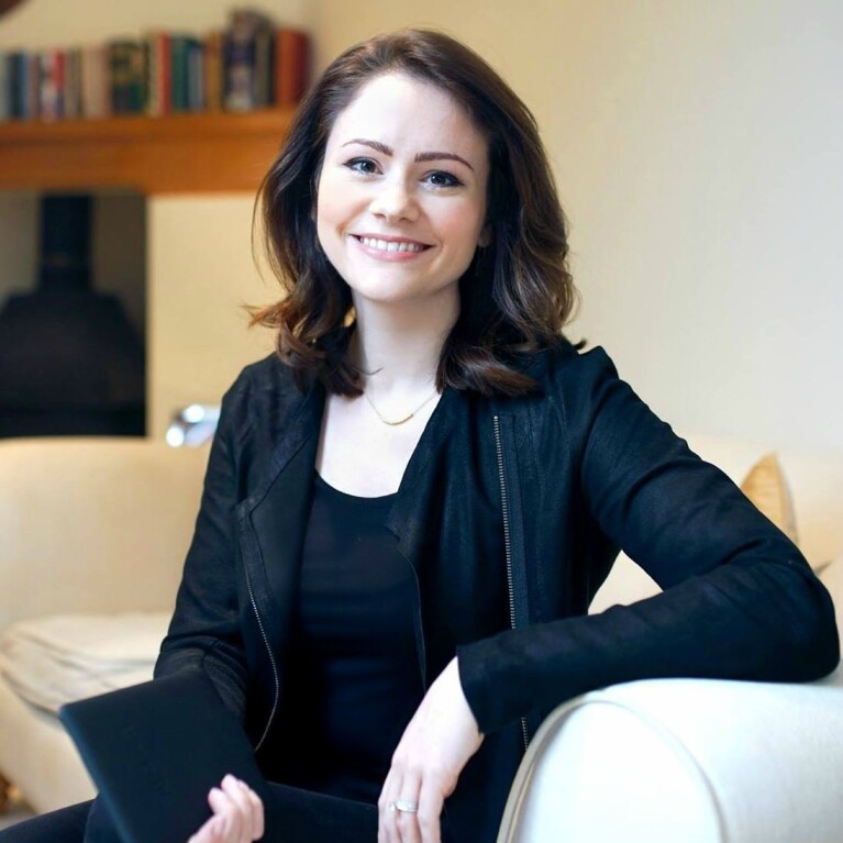 A smiling photo of author LJ Ross