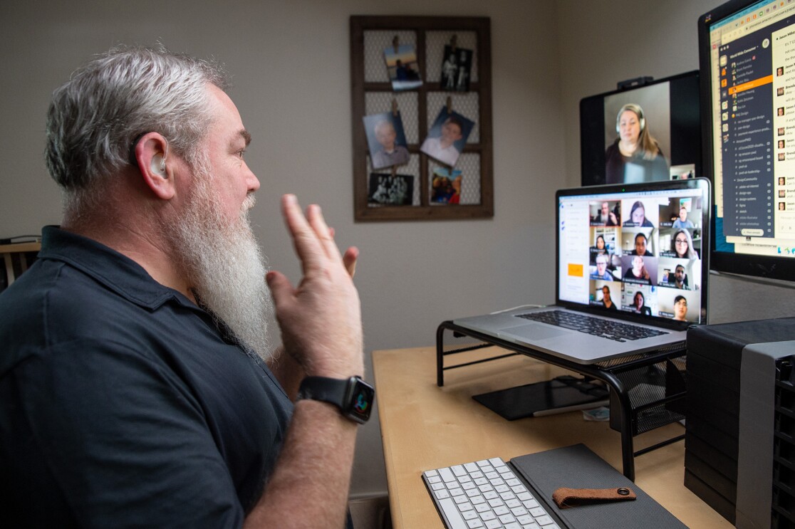 Amazon employee Brenden, who is deaf, photographed as he engages in his day-to-day life