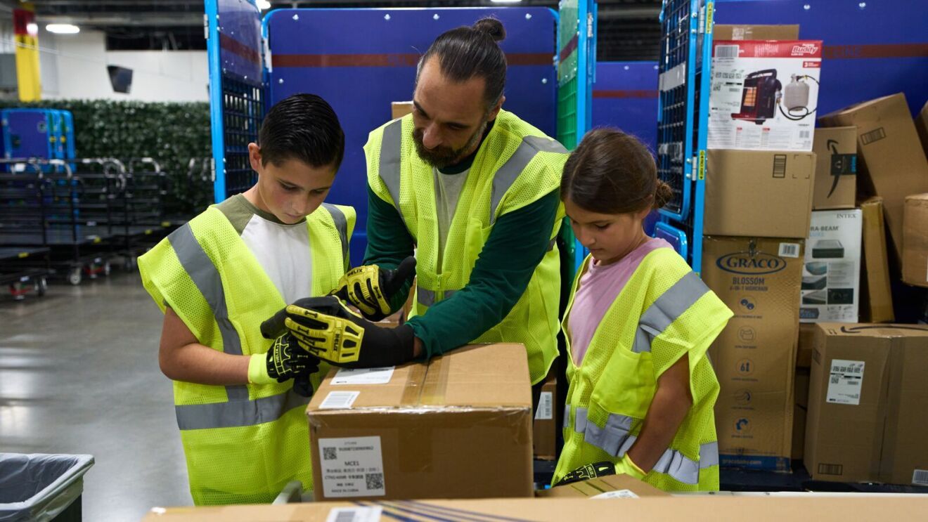 Kids join their parents at work at an Amazon Fulfillment Center.