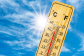 Sunny skies with a thermometer showing high heatwave temperatures 