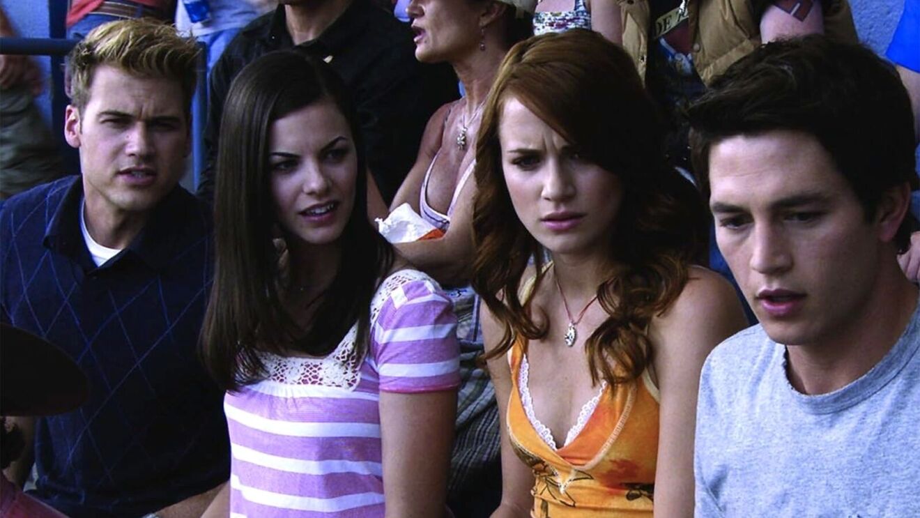 Group of young adults with serious expressions at an event