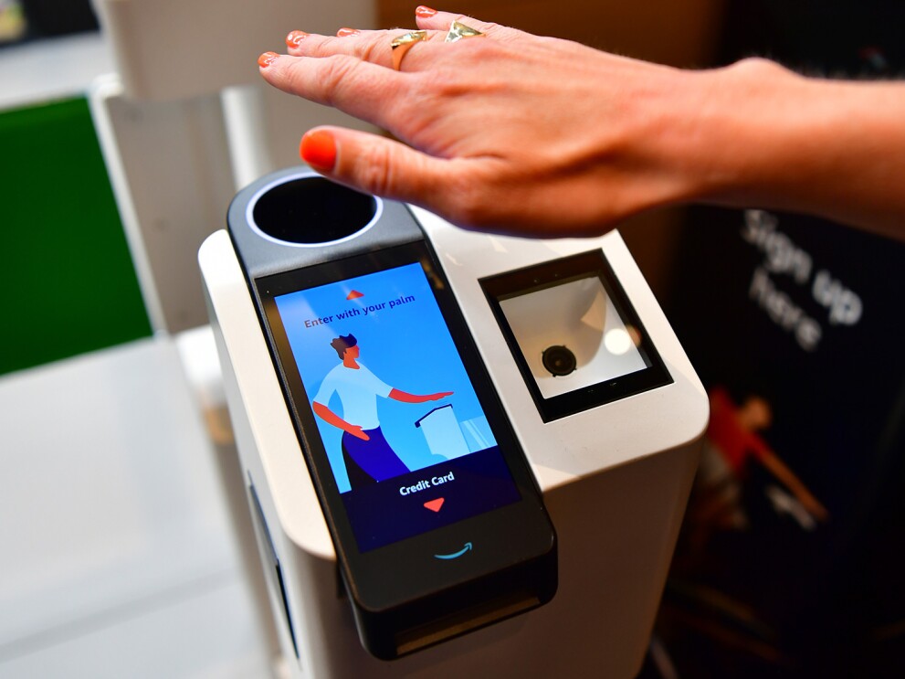 An image of the palm scanning technology that allows customers to enter and exit a store while purchasing their items without a cashier.